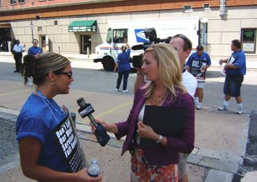 Jen Salley being interviewed at the protest